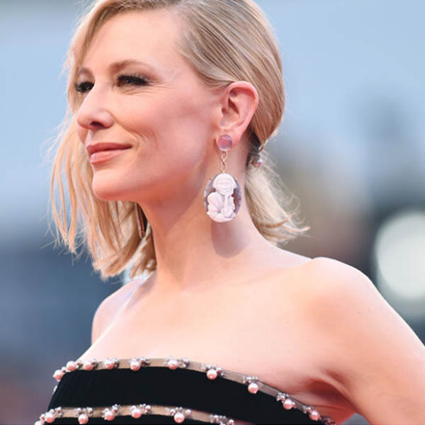 Cate Blanchett at the "Joker" Premiere in LizWorks Cameo Earrings by Cindy Sherman. 