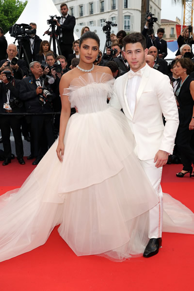 Priyanka Chopra and Nick Jonas at the 2019 Cannes Film Festival, one example of wedding white gowns at Cannes were the inspiration for brides planning weddings in 2020