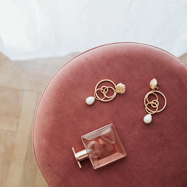 Jewelry on Ottoman after being Cleaned with Non-Toxic Cleaner