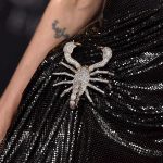 Scorpion jewelry on dress