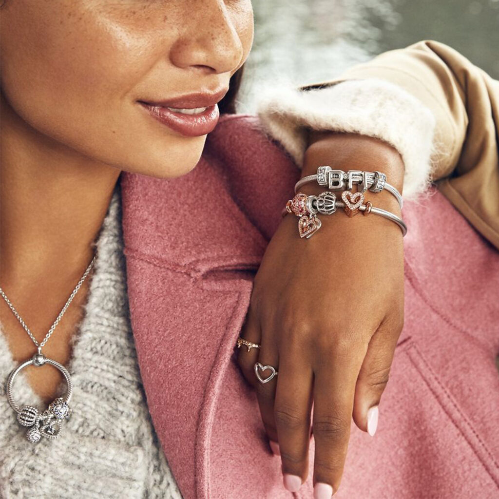 Model wearing Pandora bracelet and Charms